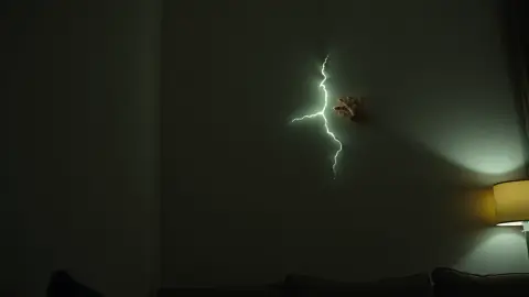 Glowing crack effect on a living room wall appearing slightly offset from the corner