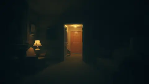 Eerie living room at night with an open doorway leading to a dark hallway