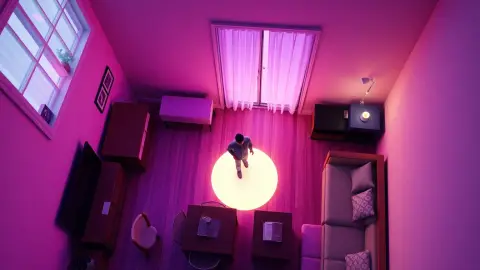Cutaway diorama of a small room with a glowing cleared zone in the middle