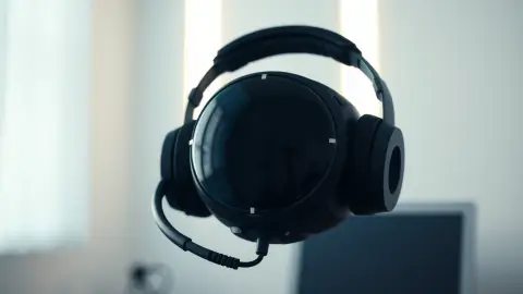 Headset in a softly lit room with faint translucent cones radiating from the front showing camera fields of view