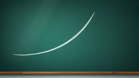Chalkboard with a descending curve drawn in chalk