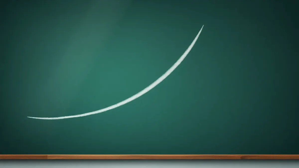 Chalkboard with a descending curve drawn in chalk