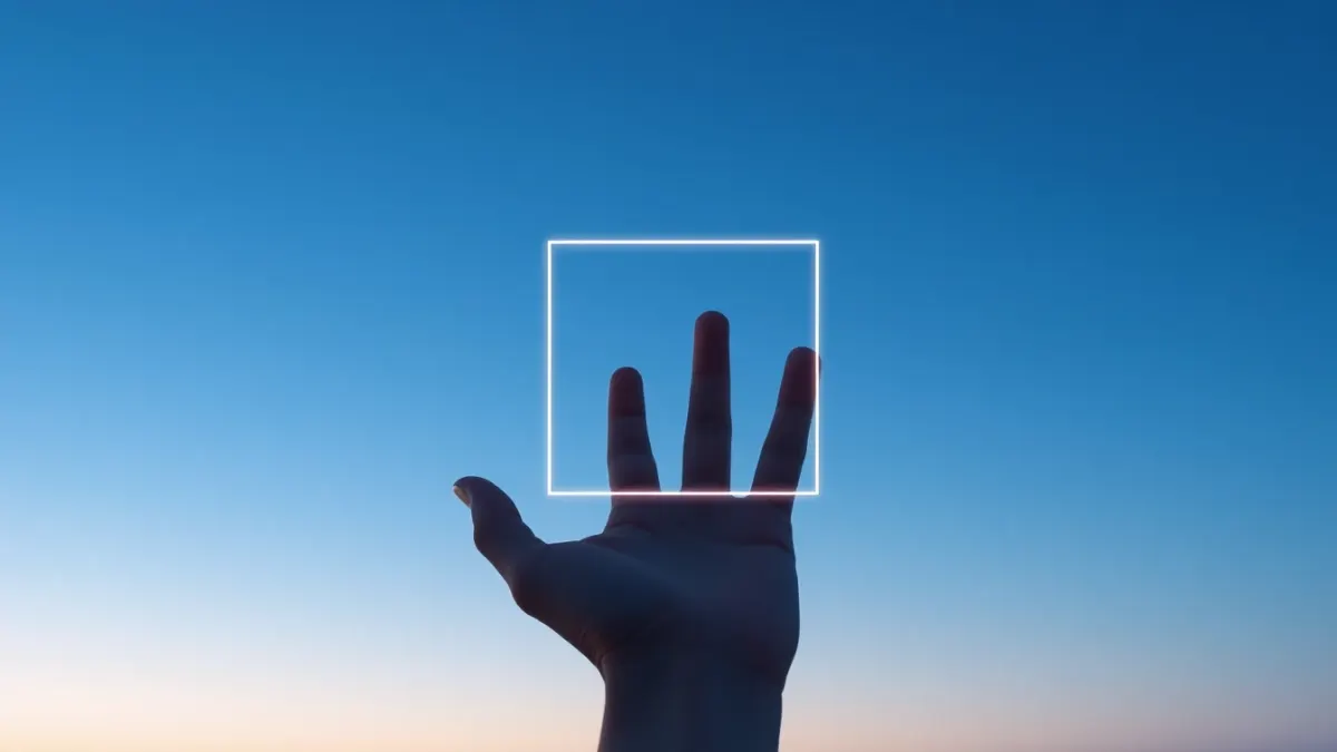 Hand tracing a square shape in the air to illustrate box breathing