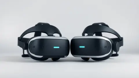 Two generic VR headsets side by side on a neutral backdrop